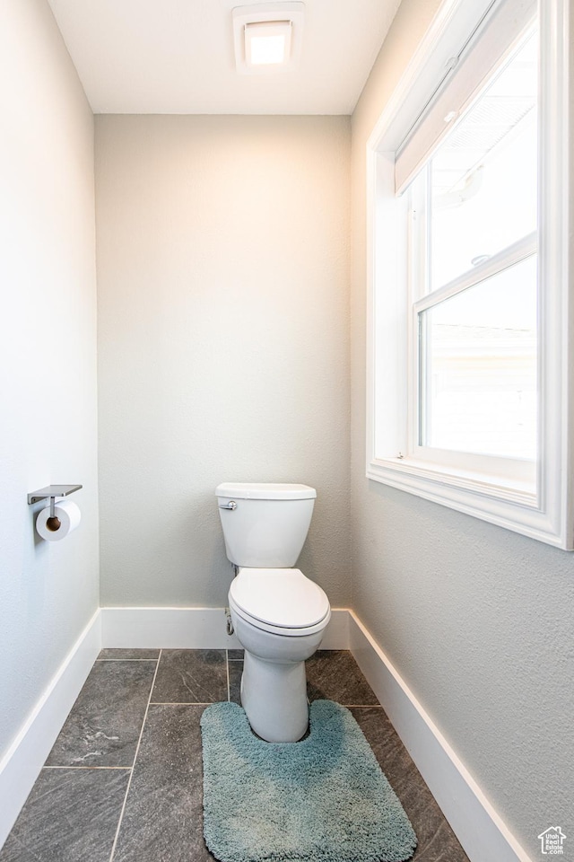 1027 S 920 W, Hurricane, UT 84737 - bathroom featuring toilet and baseboards