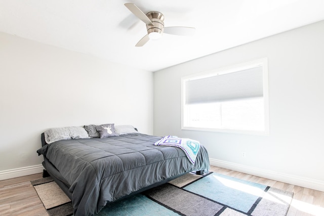 1027 S 920 W, Hurricane, UT 84737 - bedroom featuring a ceiling fan, light wood-style flooring, and baseboards