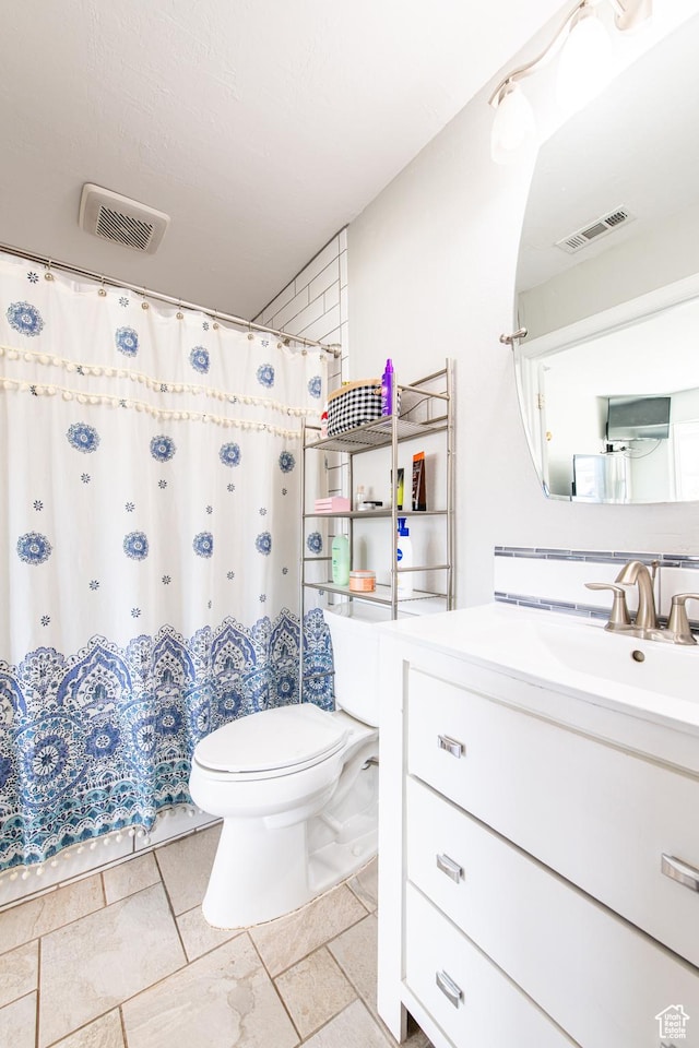 1027 S 920 W, Hurricane, UT 84737 - bathroom with toilet, visible vents, a shower with shower curtain, and vanity
