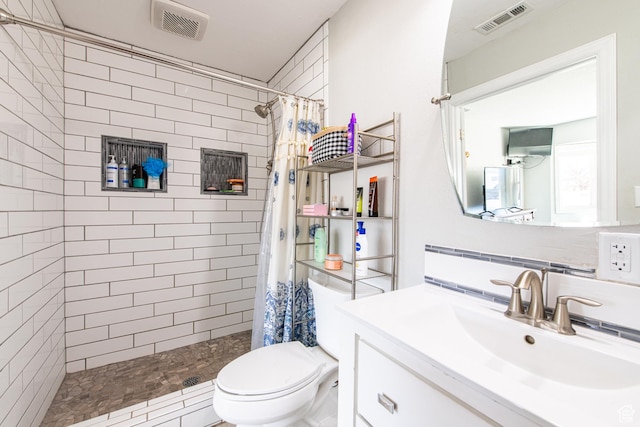 1027 S 920 W, Hurricane, UT 84737 - bathroom featuring toilet, visible vents, tiled shower, and vanity