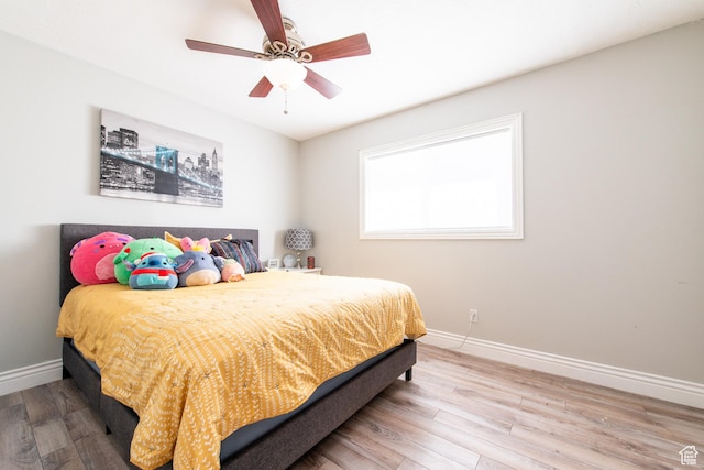 1027 S 920 W, Hurricane, UT 84737 - bedroom featuring ceiling fan, baseboards, and wood finished floors