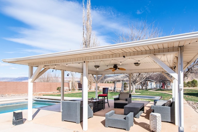 1027 S 920 W, Hurricane, UT 84737 - view of patio / terrace with ceiling fan, a fenced backyard, an outdoor hangout area, a gazebo, and a fenced in pool