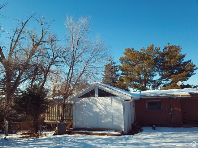 3794 Hermes Dr, Salt Lake City, UT 84124 - snow covered garage with fence