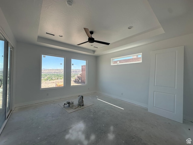 591 S 1800 W, Hurricane, UT 84737 - spare room featuring a raised ceiling, a wealth of natural light, baseboards, and ceiling fan