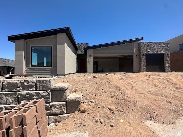 591 S 1800 W, Hurricane, UT 84737 - view of front of property featuring a garage and stone siding