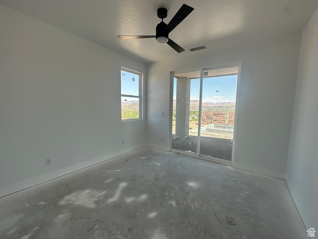 591 S 1800 W, Hurricane, UT 84737 - unfurnished room with baseboards, visible vents, ceiling fan, and a healthy amount of sunlight