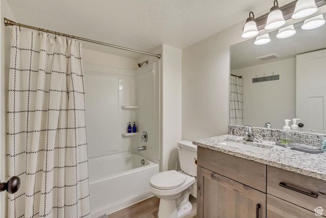 full bath featuring shower / tub combo, visible vents, vanity, and toilet