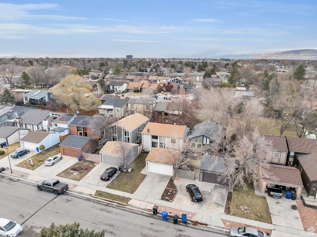 birds eye view of property with a residential view