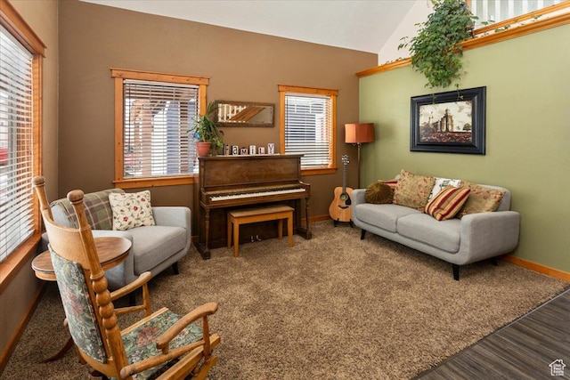 550 N 200 E, Wellsville, UT 84339 - living area with baseboards, wood finished floors, and lofted ceiling