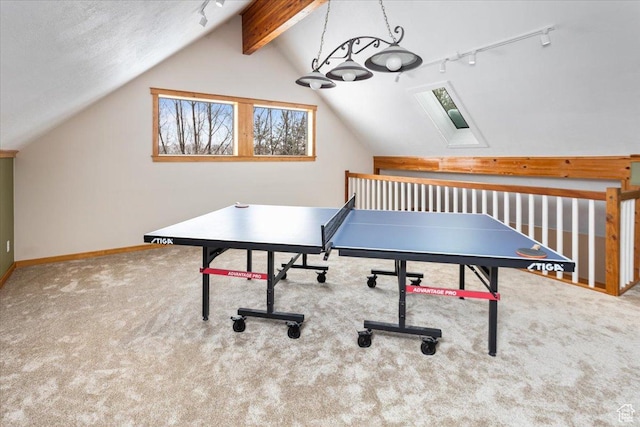 550 N 200 E, Wellsville, UT 84339 - rec room with rail lighting, baseboards, carpet floors, and vaulted ceiling with skylight