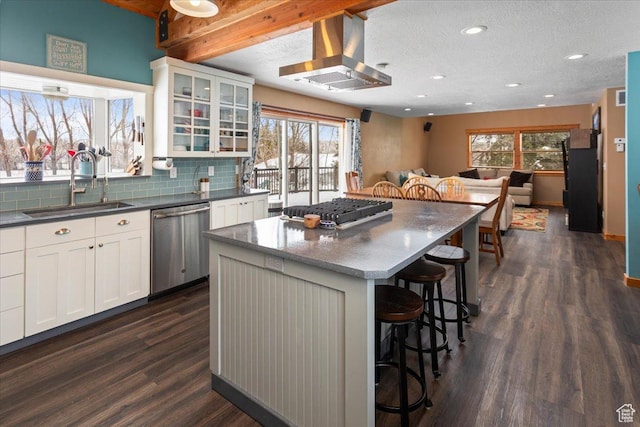 550 N 200 E, Wellsville, UT 84339 - kitchen featuring a kitchen breakfast bar, a sink, appliances with stainless steel finishes, dark wood-type flooring, and island exhaust hood