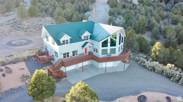 drone / aerial view with a view of trees