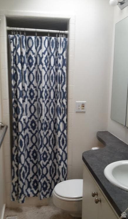 134 E 175 S, North Salt Lake, UT 84054 - full bath featuring toilet, a shower with shower curtain, and vanity