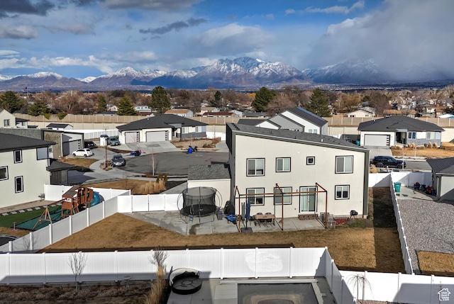 exterior space featuring a mountain view and a residential view