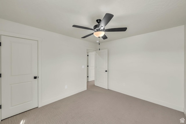 560 W Aqua Cv Unit 506, St George, UT 84790 - unfurnished bedroom with a ceiling fan, carpet flooring, and baseboards