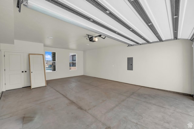 560 W Aqua Cv Unit 506, St George, UT 84790 - garage featuring a garage door opener and electric panel