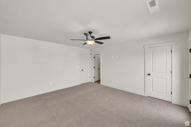 560 W Aqua Cv Unit 506, St George, UT 84790 - empty room featuring light carpet, baseboards, visible vents, and a ceiling fan
