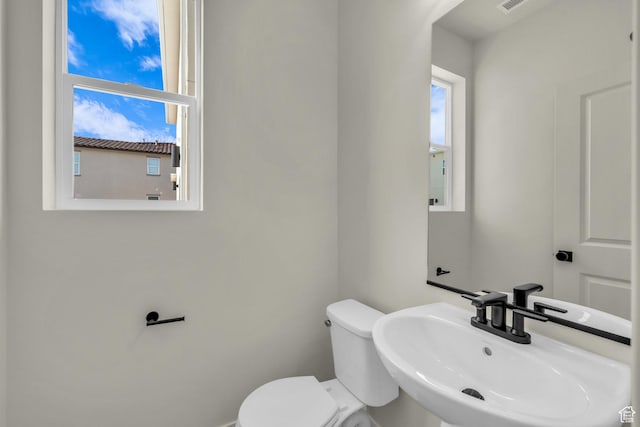 560 W Aqua Cv Unit 506, St George, UT 84790 - bathroom featuring toilet, visible vents, and a sink