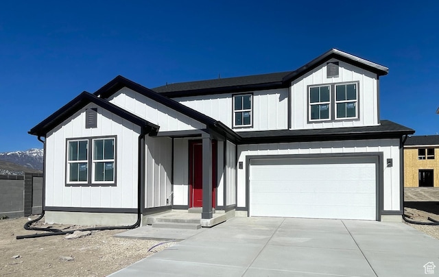 view of front facade featuring an attached garage and driveway