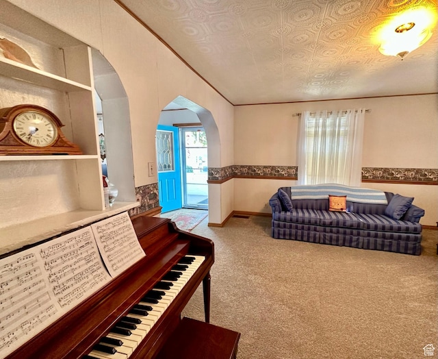 516 S Freedom Blvd, Provo, UT 84601 - carpeted living area featuring baseboards, arched walkways, and crown molding