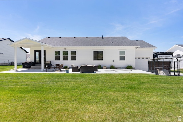 628 S 1080 E, Smithfield, UT 84335 - back of house featuring a lawn, a patio area, and a shingled roof