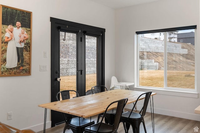 628 S 1080 E, Smithfield, UT 84335 - dining area with plenty of natural light, baseboards, and light wood-type flooring