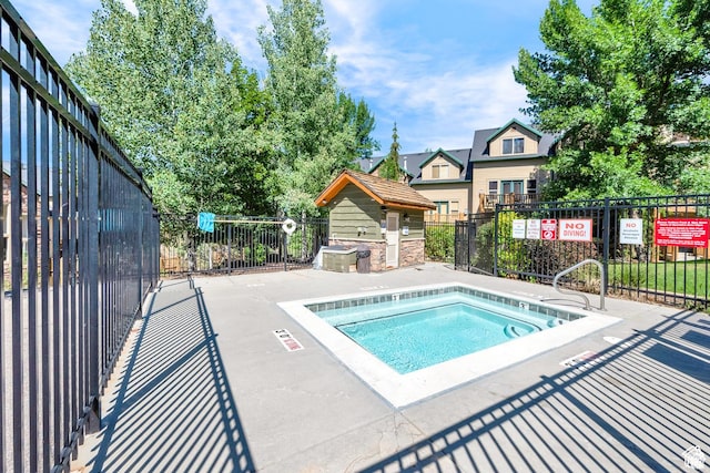 3612 N Huntsman Path Unit 603, Eden, UT 84310 - view of pool featuring fence and a hot tub