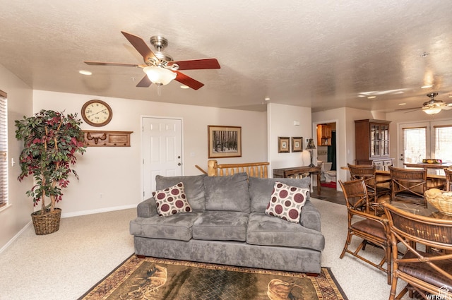3612 N Huntsman Path Unit 603, Eden, UT 84310 - carpeted living area featuring ceiling fan, a textured ceiling, and baseboards