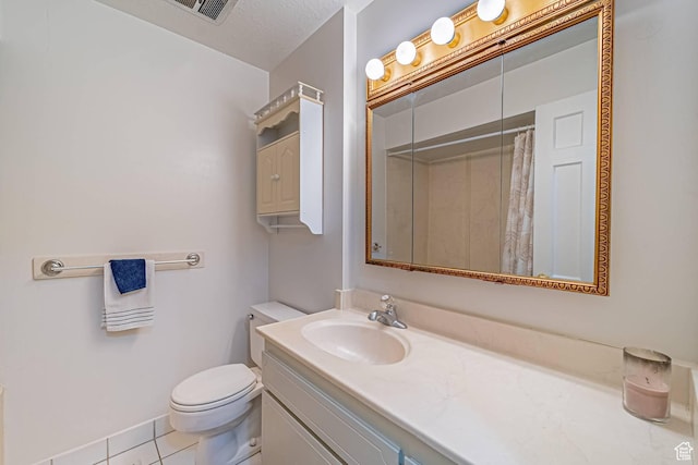 full bathroom with visible vents, toilet, a textured ceiling, vanity, and tile patterned floors