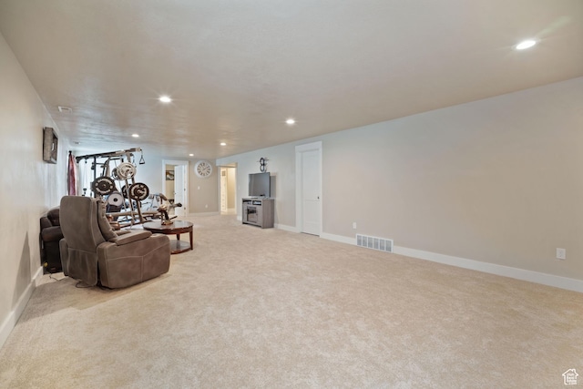 24 S 900 E, Hyde Park, UT 84318 - living room featuring light carpet, baseboards, visible vents, and recessed lighting
