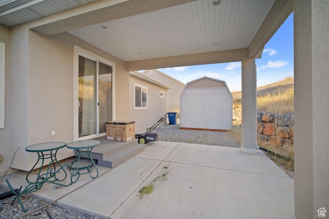 24 S 900 E, Hyde Park, UT 84318 - view of patio / terrace with an outbuilding and a shed
