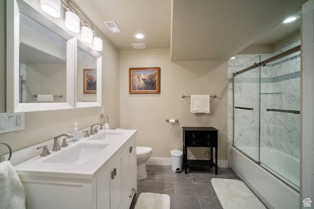 24 S 900 E, Hyde Park, UT 84318 - bathroom with toilet, double vanity, baseboards, and a sink