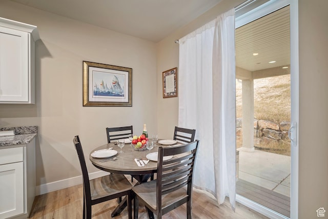 24 S 900 E, Hyde Park, UT 84318 - dining space with light wood-type flooring and baseboards