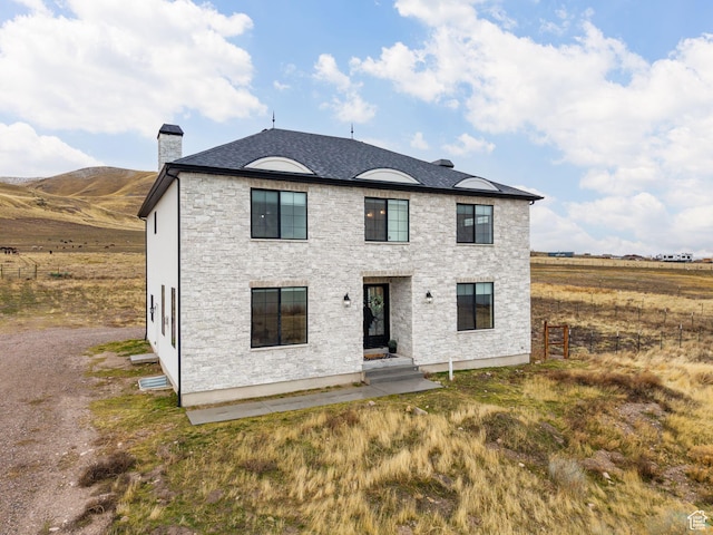 5351 S Lincoln Beach Rd, Spanish Fork, UT 84660 - view of front of house featuring roof with shingles, fence, and a chimney
