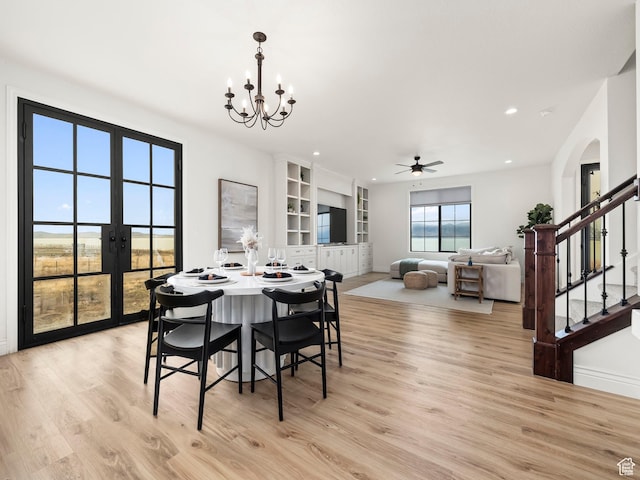 5351 S Lincoln Beach Rd, Spanish Fork, UT 84660 - dining space with light wood-style floors, recessed lighting, french doors, and stairs