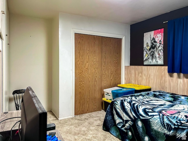 carpeted bedroom with a closet