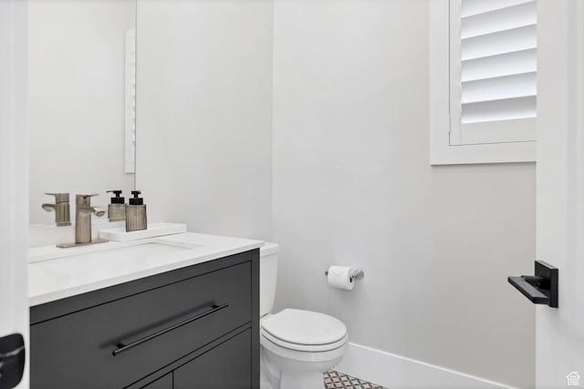 219 W Elinor Ln, Washington, UT 84780 - bathroom with baseboards, vanity, and toilet