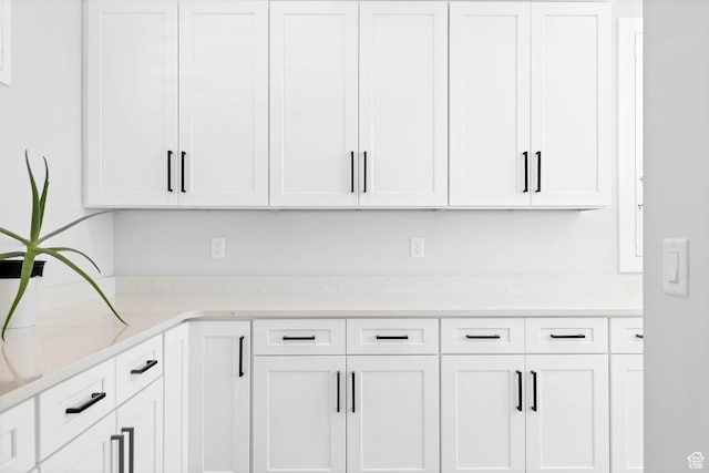 219 W Elinor Ln, Washington, UT 84780 - kitchen with white cabinetry and light countertops