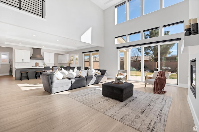 219 W Elinor Ln, Washington, UT 84780 - living area with light wood-style floors, baseboards, and recessed lighting