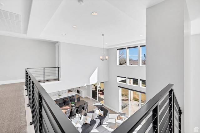 219 W Elinor Ln, Washington, UT 84780 - hall featuring plenty of natural light, a notable chandelier, and an upstairs landing