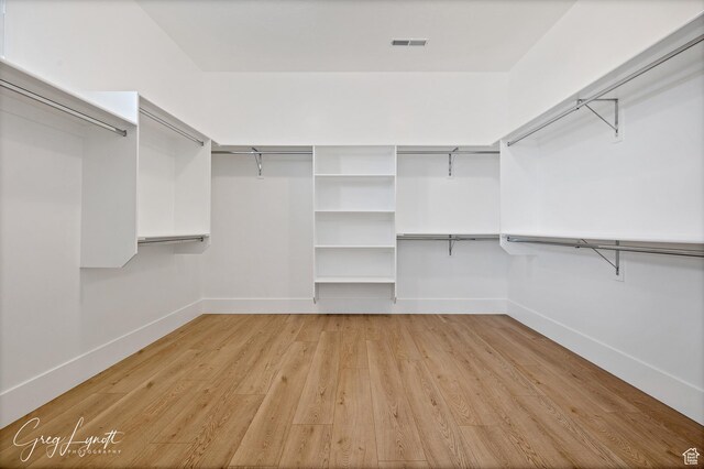 219 W Elinor Ln, Washington, UT 84780 - walk in closet featuring visible vents and light wood-style floors