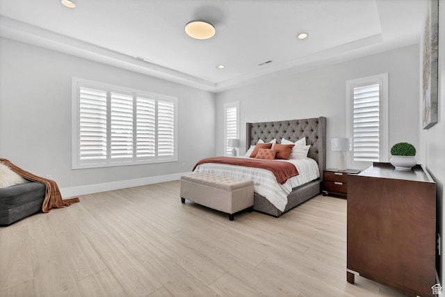 219 W Elinor Ln, Washington, UT 84780 - bedroom featuring light wood finished floors, baseboards, a raised ceiling, and recessed lighting