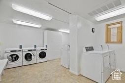 777 E S Temple S Unit 4A, Salt Lake City, UT 84102 - communal laundry room with washing machine and dryer