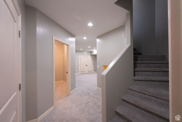 stairs featuring carpet floors, recessed lighting, and baseboards