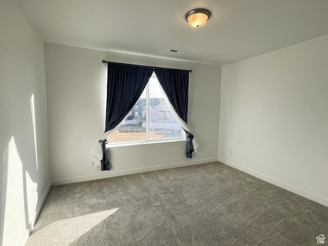 8416 N Sun Crest Dr, Eagle Mountain, UT 84005 - empty room featuring carpet floors, baseboards, and visible vents