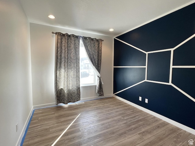 8416 N Sun Crest Dr, Eagle Mountain, UT 84005 - unfurnished room featuring recessed lighting, wood finished floors, and baseboards