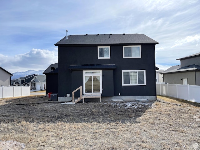 8416 N Sun Crest Dr, Eagle Mountain, UT 84005 - rear view of property with fence and central AC unit