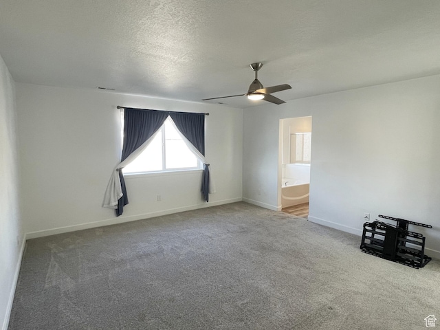 8416 N Sun Crest Dr, Eagle Mountain, UT 84005 - carpeted empty room featuring ceiling fan, a textured ceiling, and baseboards