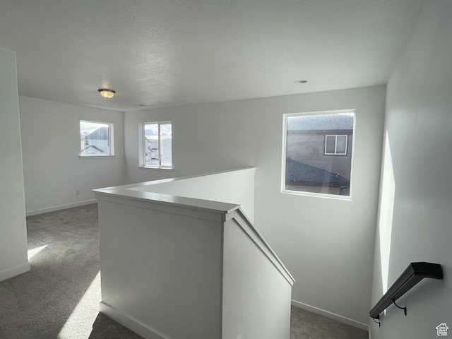 8416 N Sun Crest Dr, Eagle Mountain, UT 84005 - interior space featuring carpet flooring, an upstairs landing, and baseboards