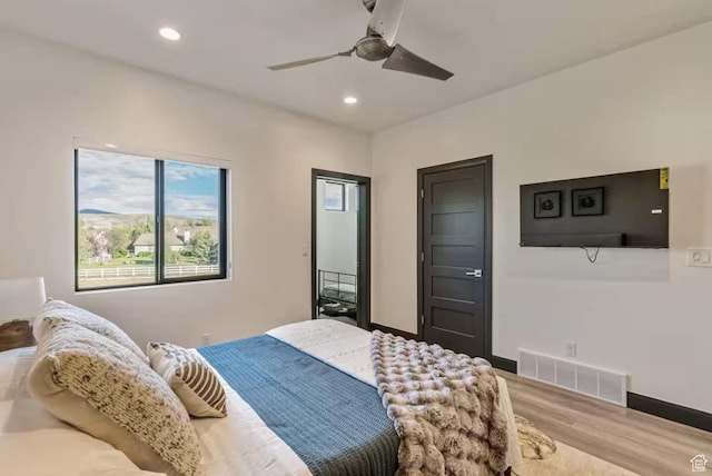 840 W Hilltop Ct, Francis, UT 84036 - bedroom featuring recessed lighting, wood finished floors, visible vents, and baseboards